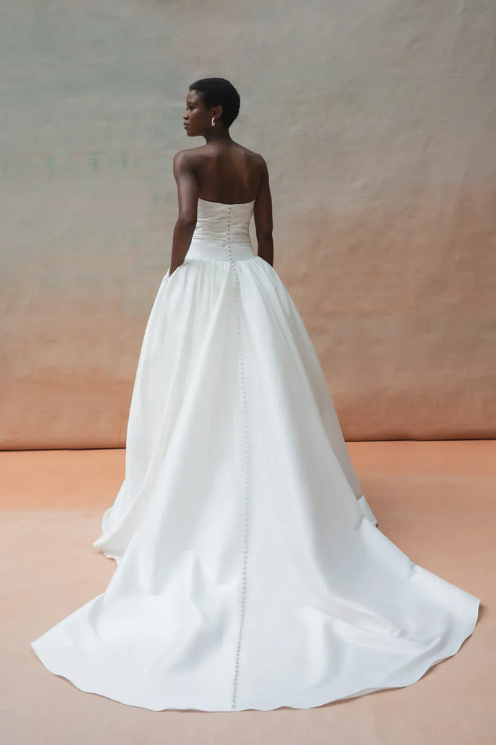 full back of jenny yoo charlotte ivory taffeta ball gown wedding dress with a drop waist and strapless bodice