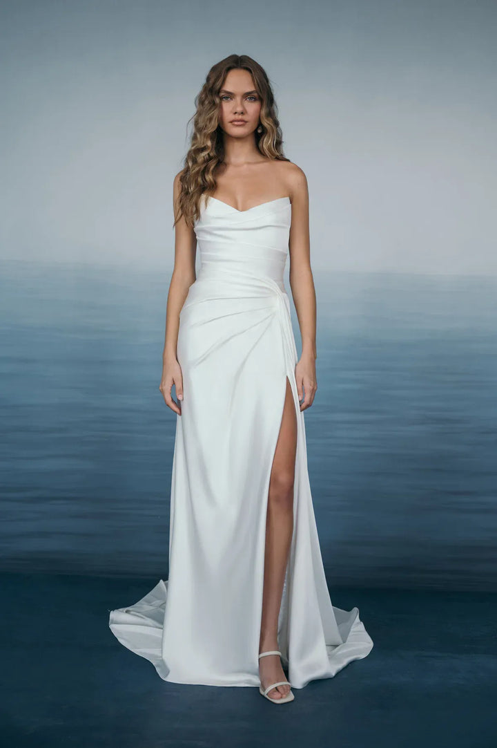 full front of jenny yoo lana satin sheath wedding dress with a strapless bodice and high slit in the skirt