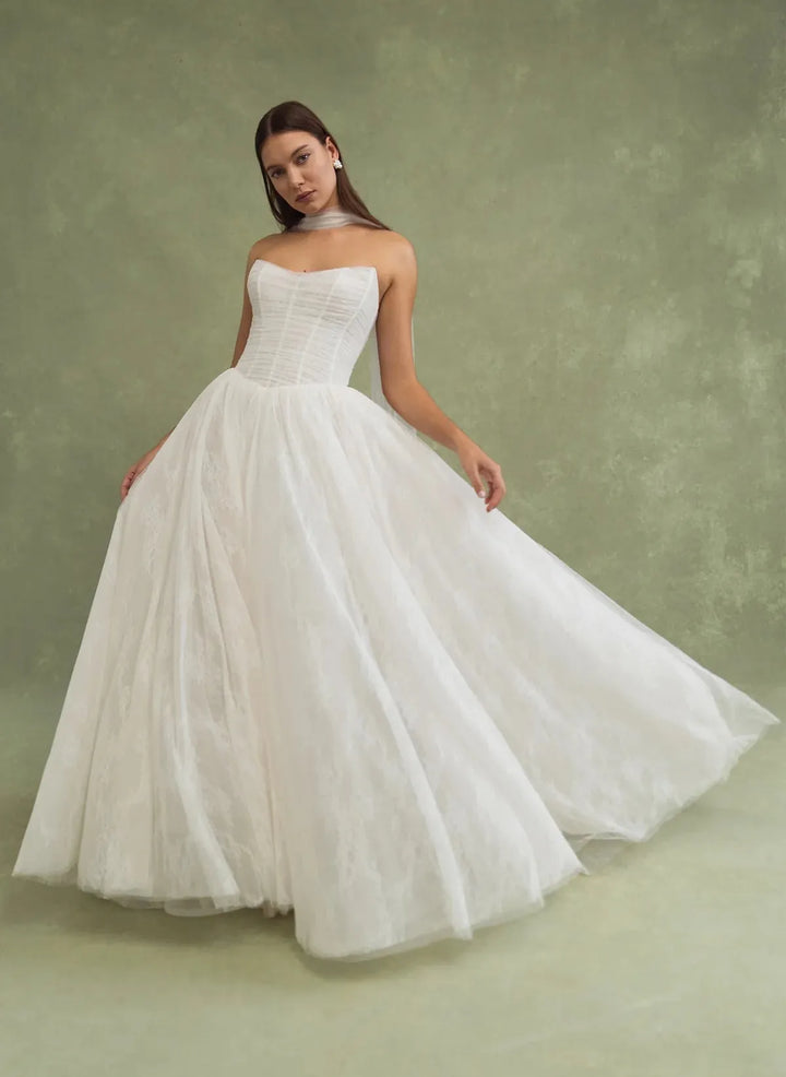 front of jenny yoo miriam ivory tulle and lacce ball gown, showing the full front with the basque waist and flowy skirt