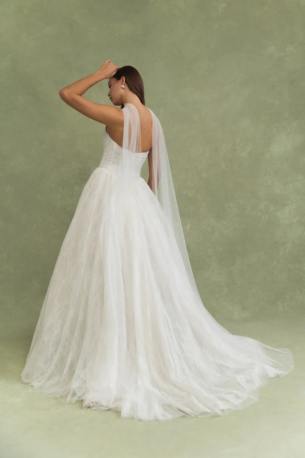 back of jenny yoo miriam ivory tulle and lacce ball gown, showing the full back with the neck scarf and short train