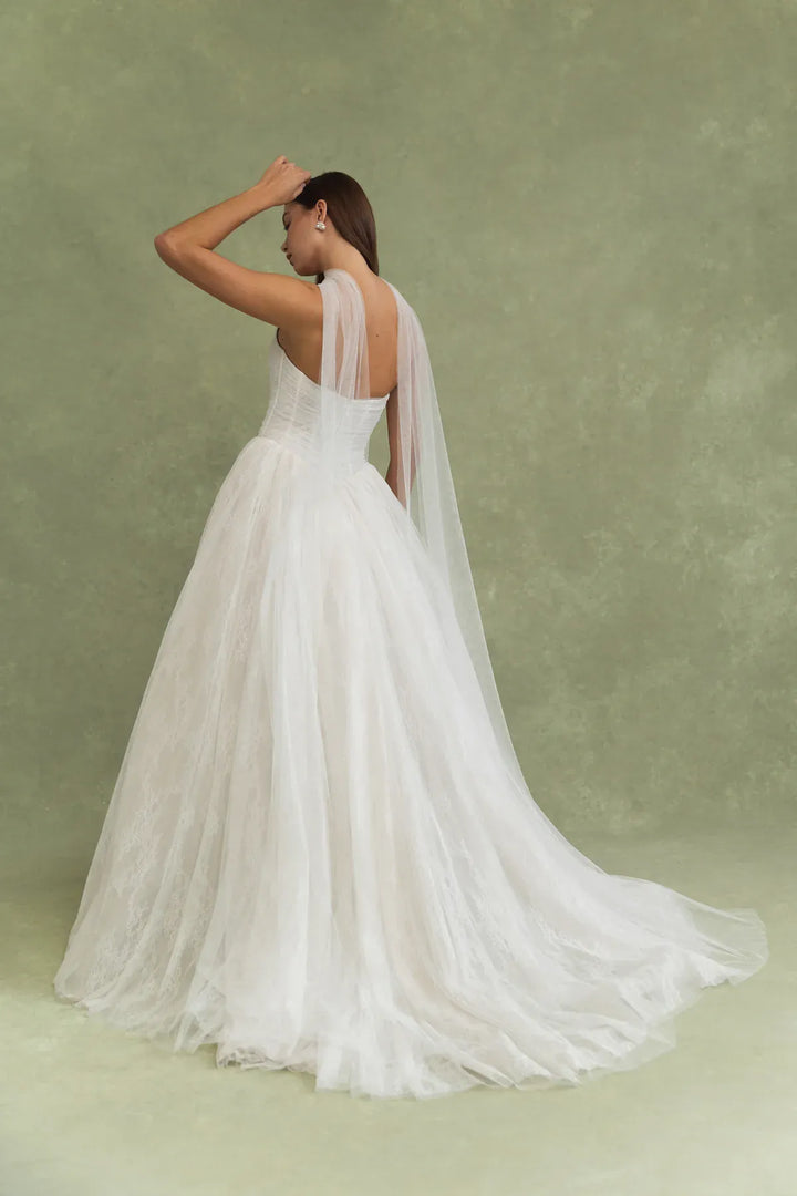 back of jenny yoo miriam ivory tulle and lacce ball gown, showing the full back with the neck scarf and short train