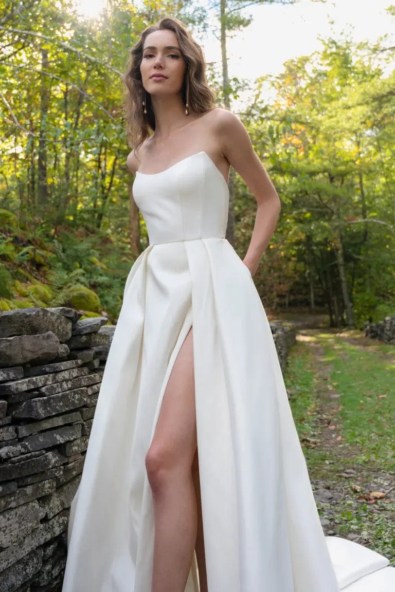 close up of jenny yoo mollie ivory taffeta a-line wedding dress showing bodice and skirt with pockets