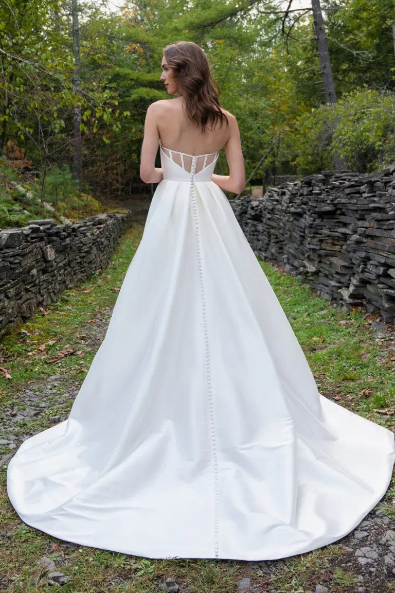 back of jenny yoo mollie ivory taffeta a-line wedding dress with sheer back and full length skirt with chapel length train