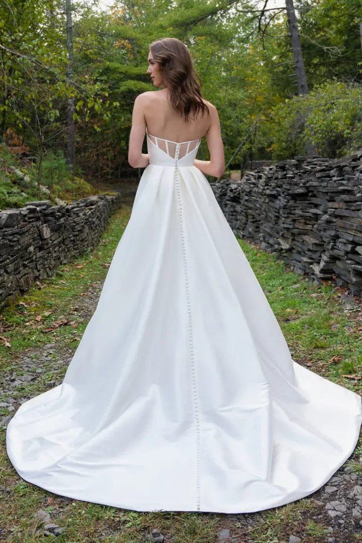 back of jenny yoo mollie ivory taffeta a-line wedding dress with sheer back and full length skirt with chapel length train