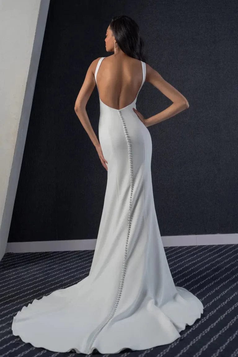 back of jenny yoo samantha ivory crepe fitted wedding dress, showing the open back and short train