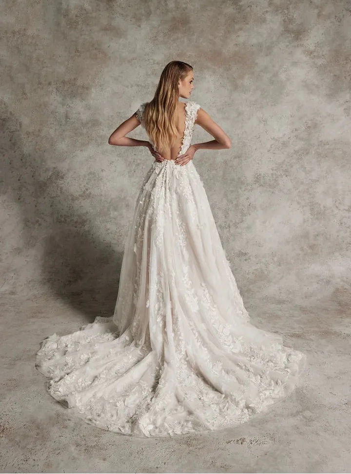 full back of justin alexander venetia nude tulle a-line wedding dress covered in floral lace accents throughout, with a low open back