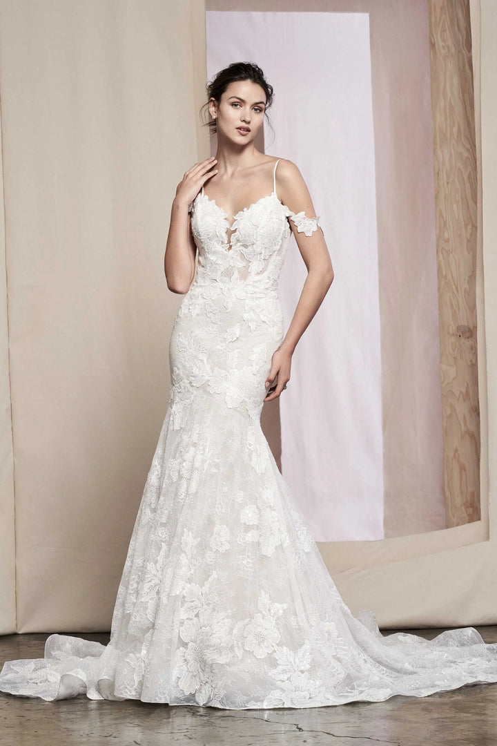 front of justin alexander tansy 99089 lace fit and flare wedding dress with v neckline, spaghetti straps, and off the shoulder straps