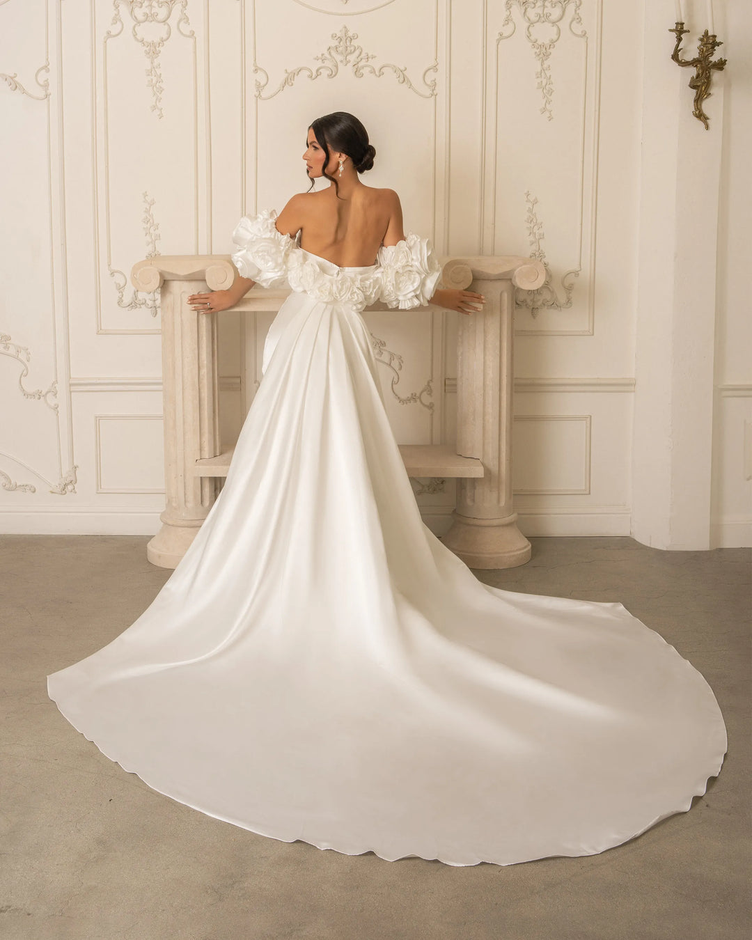 full back of kitty chen maureen ivory satin fit and flare wedding dress with the matching puff sleeves + train
