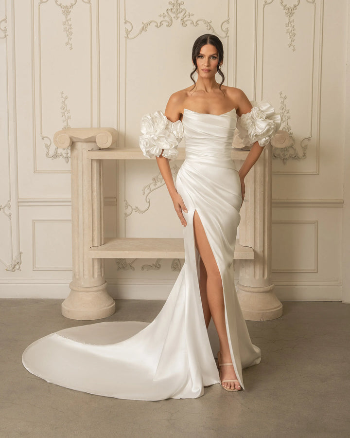 full front of kitty chen maureen ivory satin fit and flare wedding dress with the matching puff sleeves + train