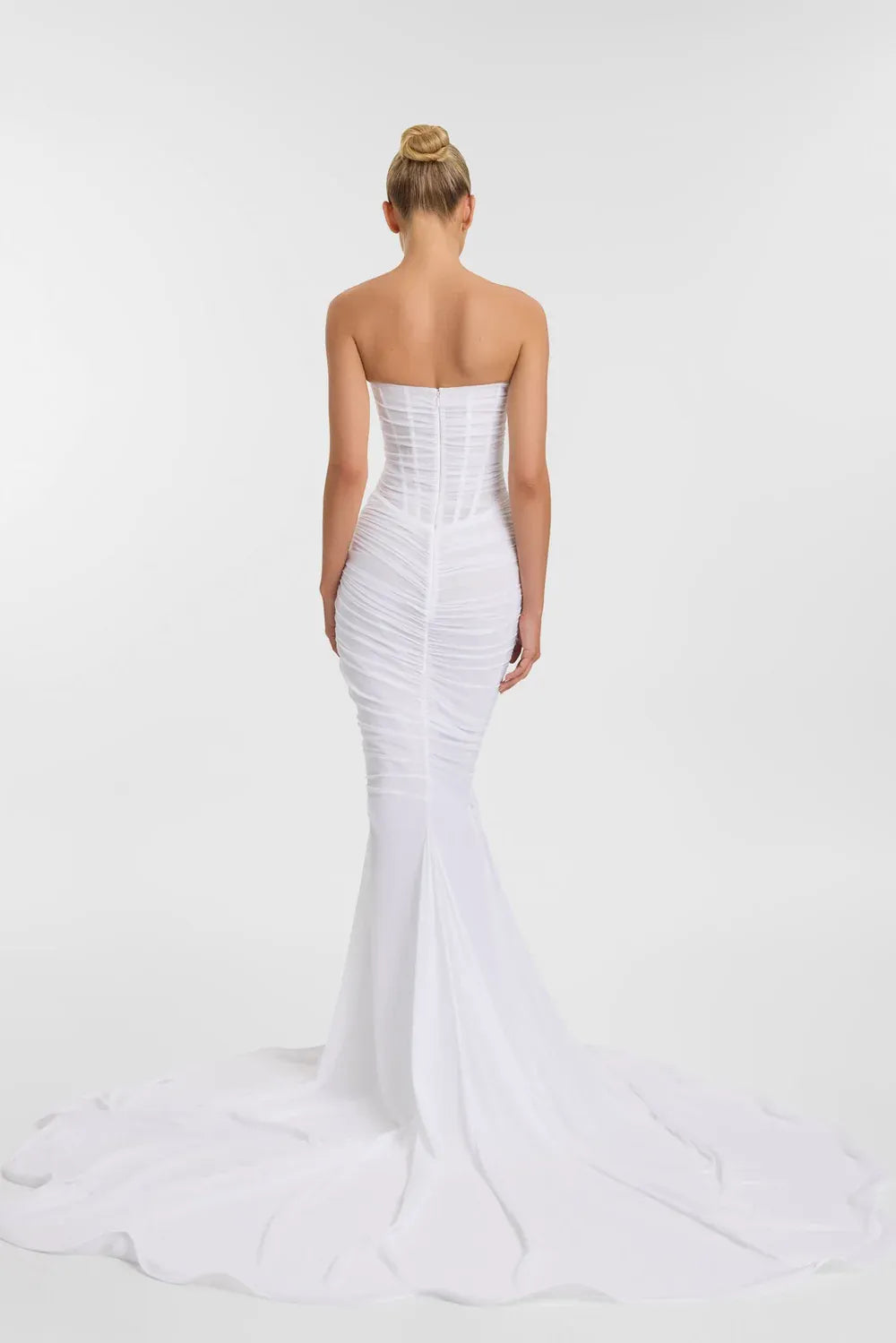 full back of kyha blanc ivory mesh fitted wedding dress with a basque waist and strapless bodice