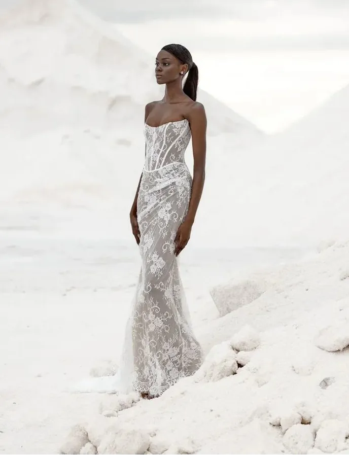 full front of kyha torrens lace fitted ivory wedding dress with a strapless scoop neckline
