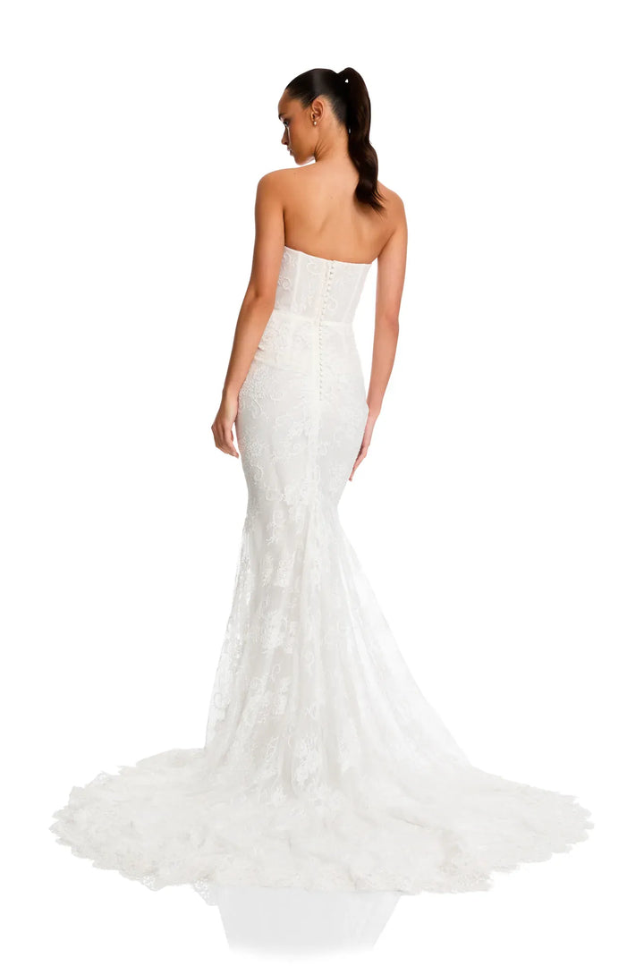 full back of kyha torrens lace fitted ivory wedding dress with a strapless scoop neckline