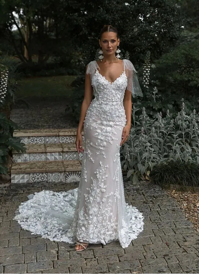 full front of madi lane ml23575 nude tulle fitted wedding dress with lace accents and shimmer tulle bows at the shoulders