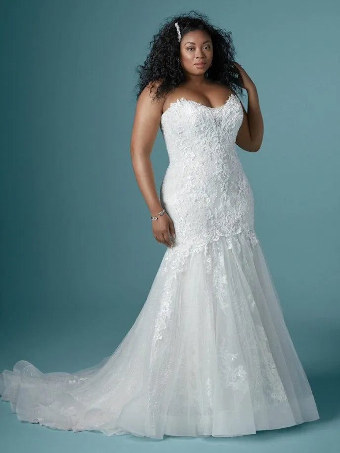 full front of maggie sottero lonnie lynette ivory lace fit ad flare wedding dress showing the strapless sweetheart bodice + flared skirt