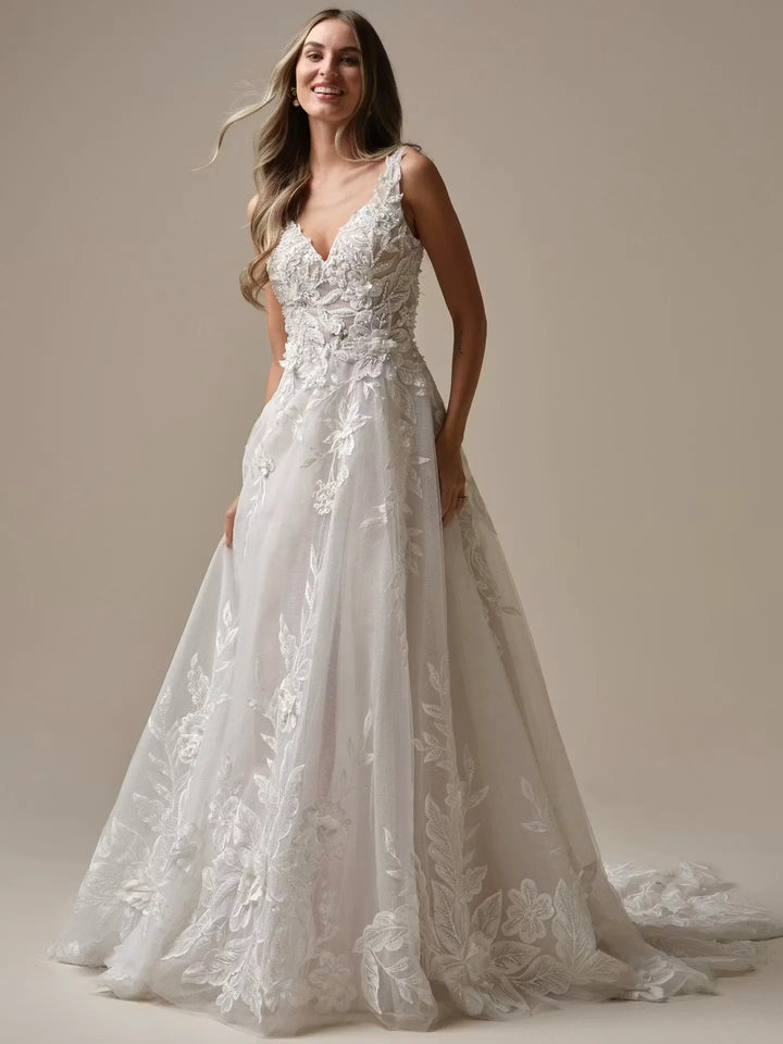 full front of maggie sottero magnolia ivory tulle a-line wedding dress with scattered lace appliques and a v neck bodice