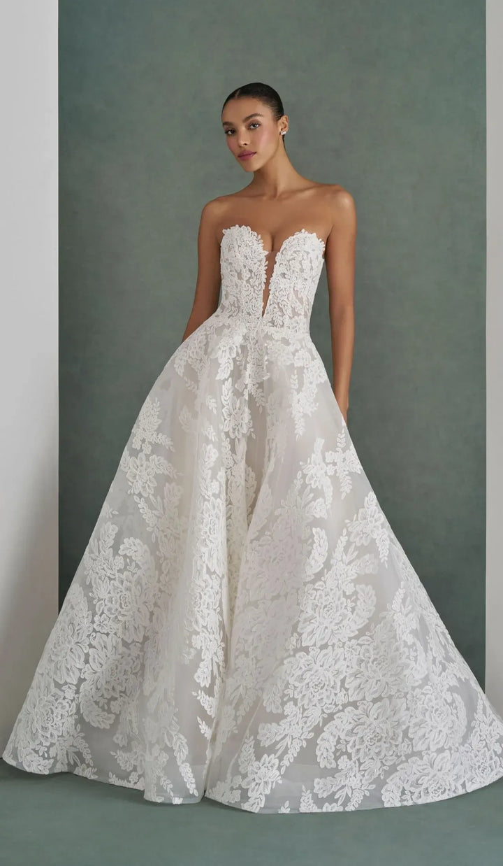 front of mark ingram cecilia ivory lace a-line wedding dress with a plunge sweetheart neckline on the strapless bodice