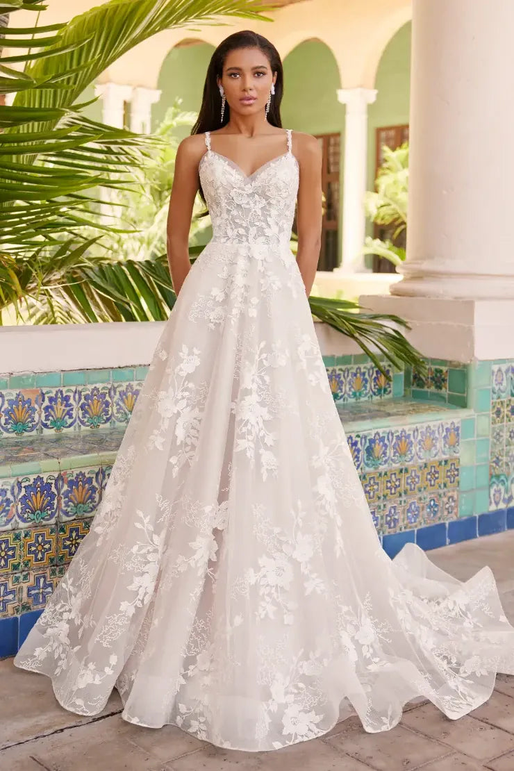 front of martin thornburg mt3237 ivory tulle a-line wedding dress showing the floral motifs scattered throughout
