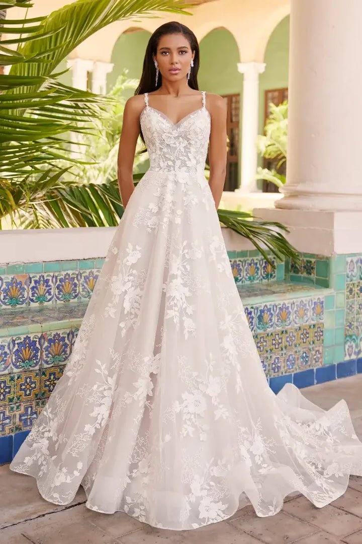 front of martin thornburg mt3237 ivory tulle a-line wedding dress showing the floral motifs scattered throughout