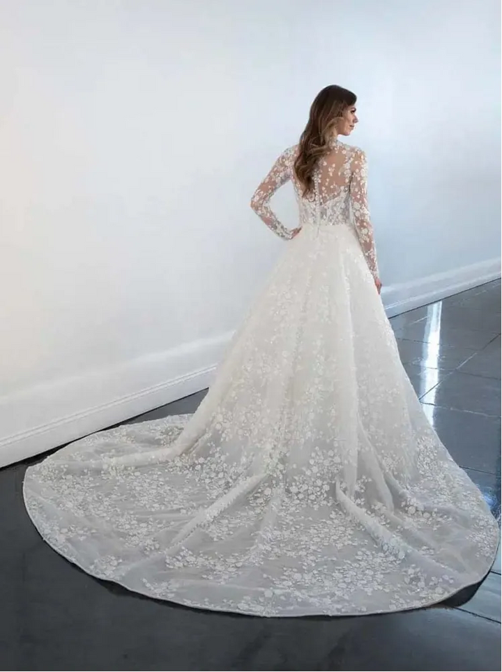 full back of martina liana ml1517 ivory lace ball gown with an illusion neckline and chapel length train