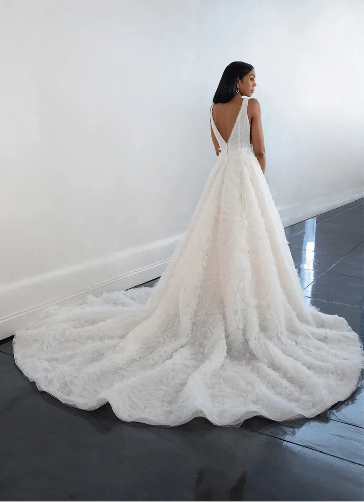back of martina liana 1531 champagne tulle ball gown, showing the full back with open back and chapel length train