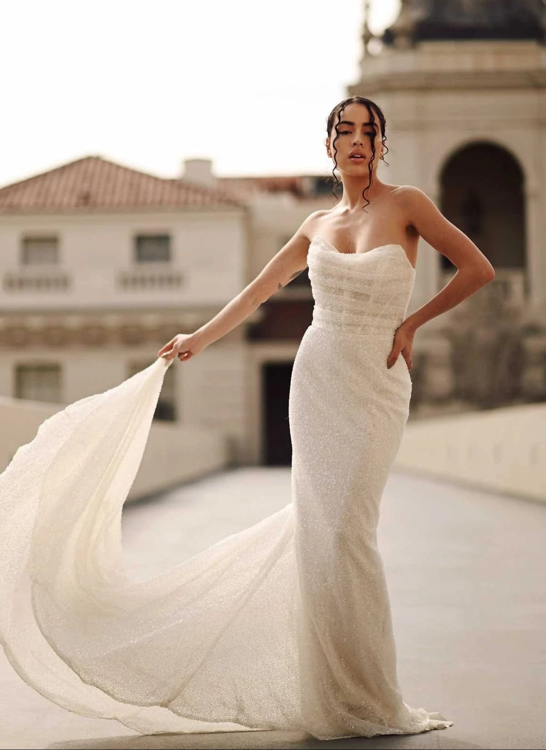 full front of martina liana 1678 ivory beaded fitted wedding dress, showing the strapless bodice and slim skirt with allover beading