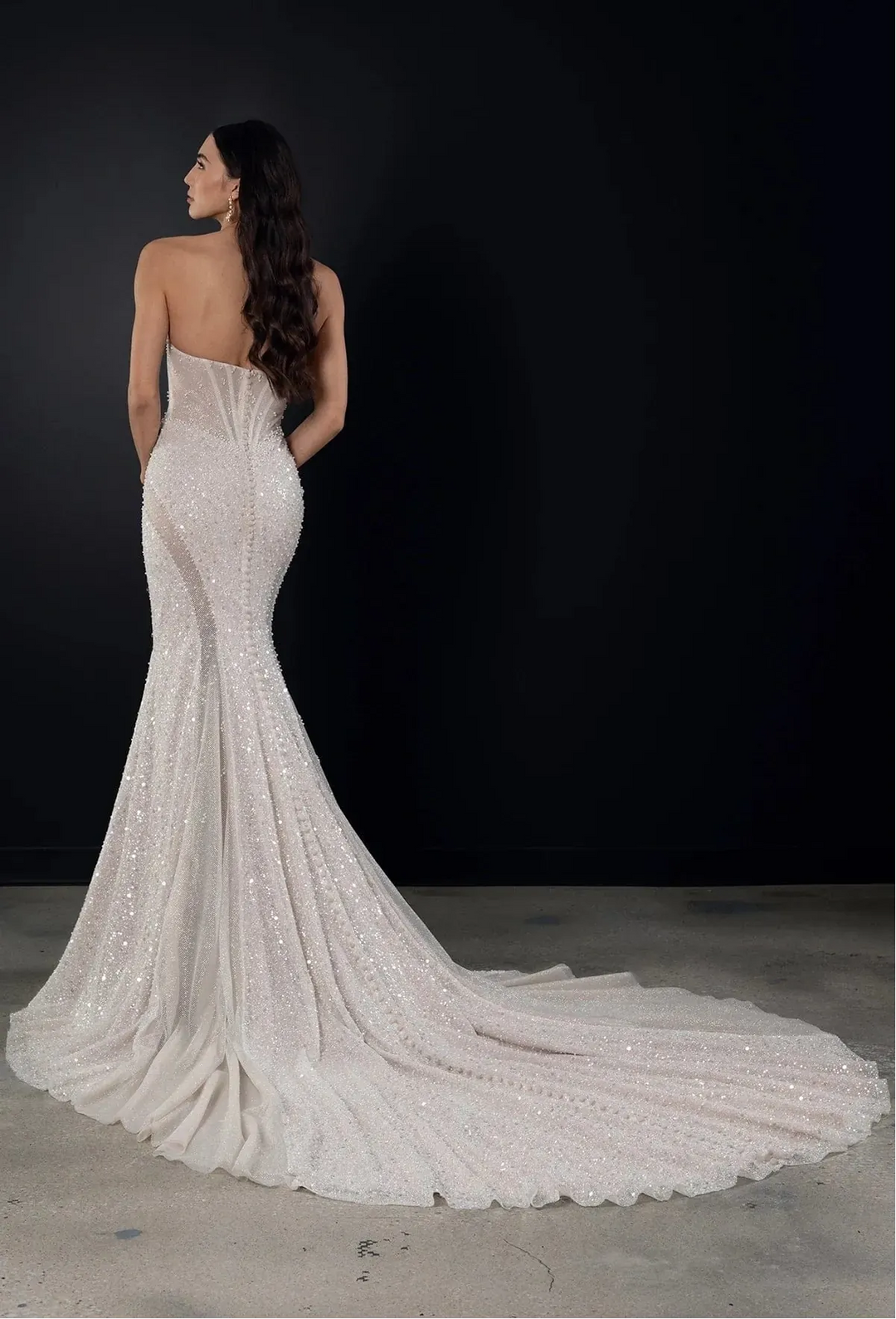 full back of martina liana 1751 ivory beading fit and flare wedding dress with a strapless sweetheart neckline