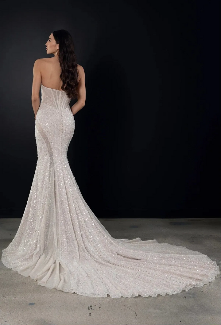 full back of martina liana 1751 ivory beading fit and flare wedding dress with a strapless sweetheart neckline