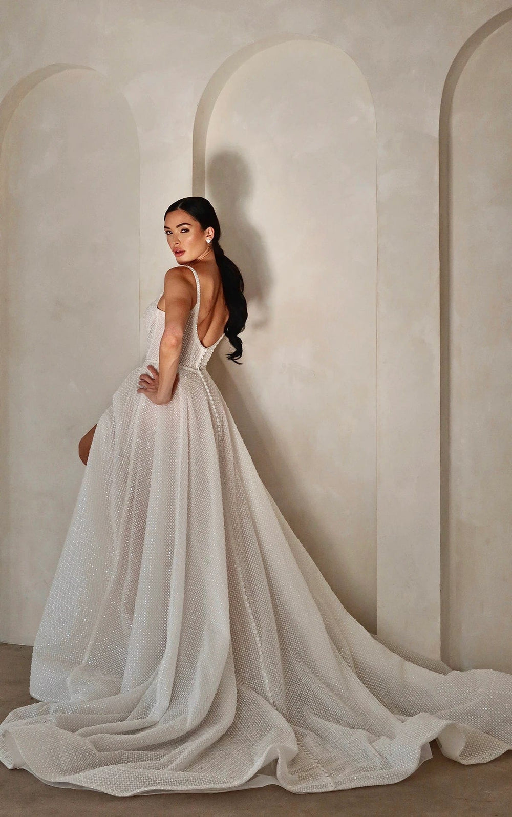 back of martina liana 1757 rum colored sparkle tulle a-line wedding dress with an open back and long train, with sparkly tulle throughout