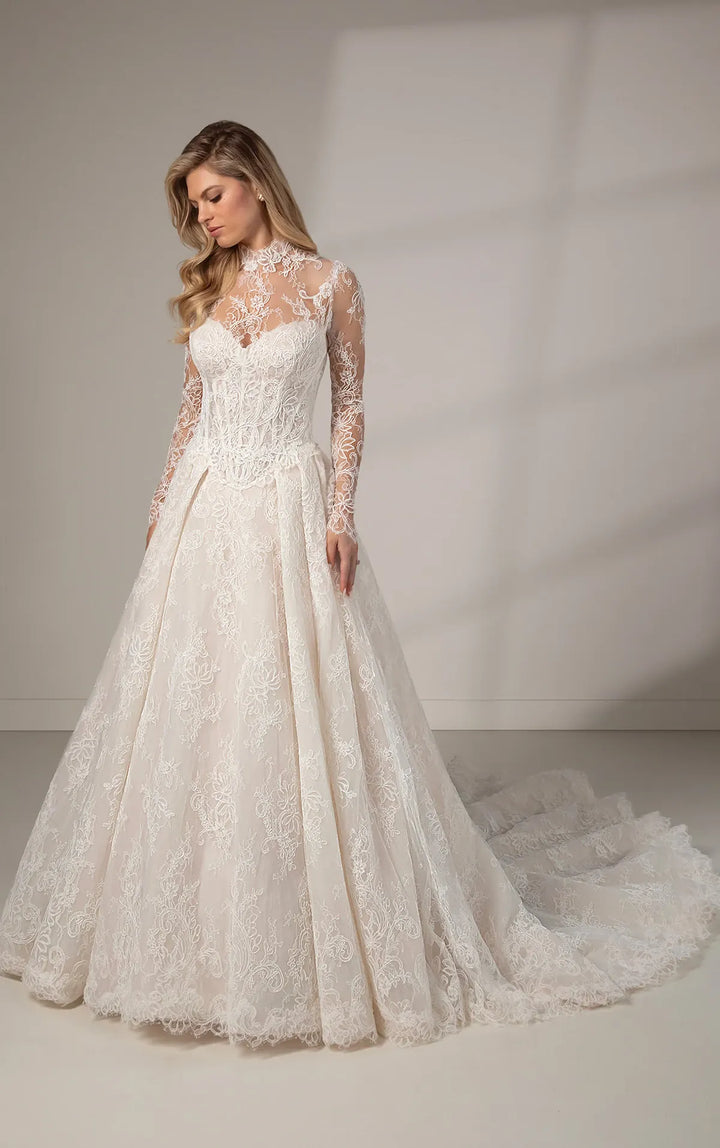 full front of martina liana le1384 ivory lace ball gown with a basque waist and matching long sleeve lace topper