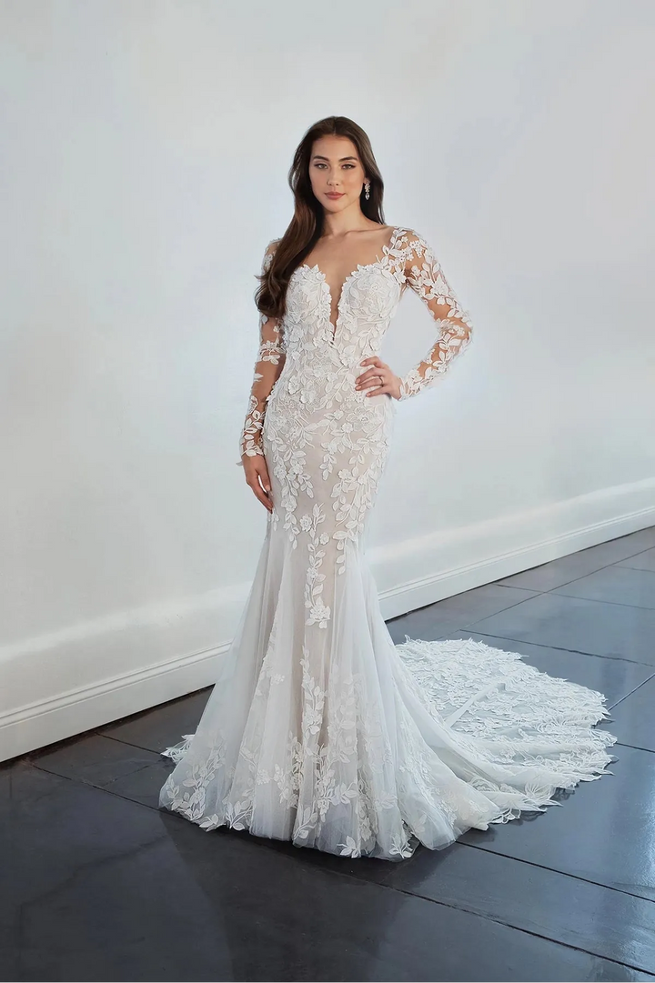full front of martina liana ml1440 nude tulle fitted wedding dress covered in floral laces, with a deep neckline and long sleeves