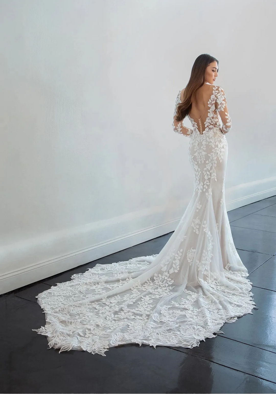 full back of martina liana ml1440 nude tulle fitted wedding dress covered in floral laces, with a sheer back and shaped train