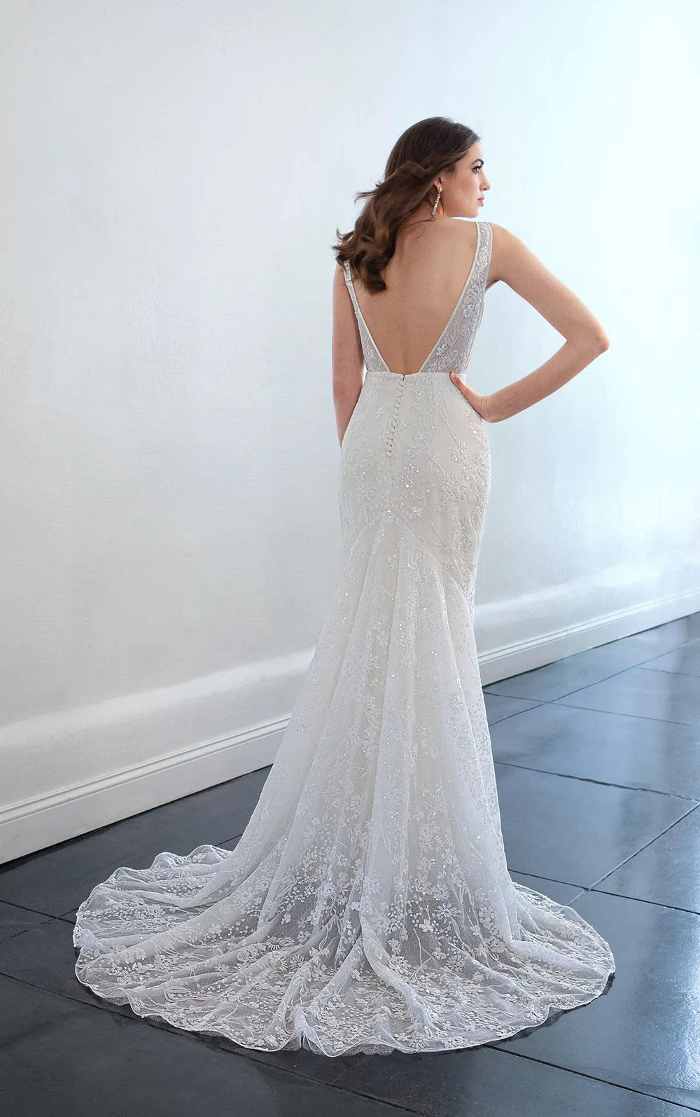 back of martina liana ml193 lace fitted wedding dress with an open back and short train