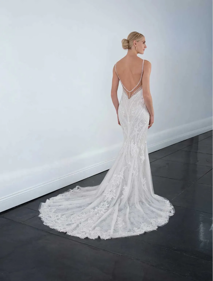 full back of martina liana ml1651 nude tulle fit and flare wedding dress with an open back and short train