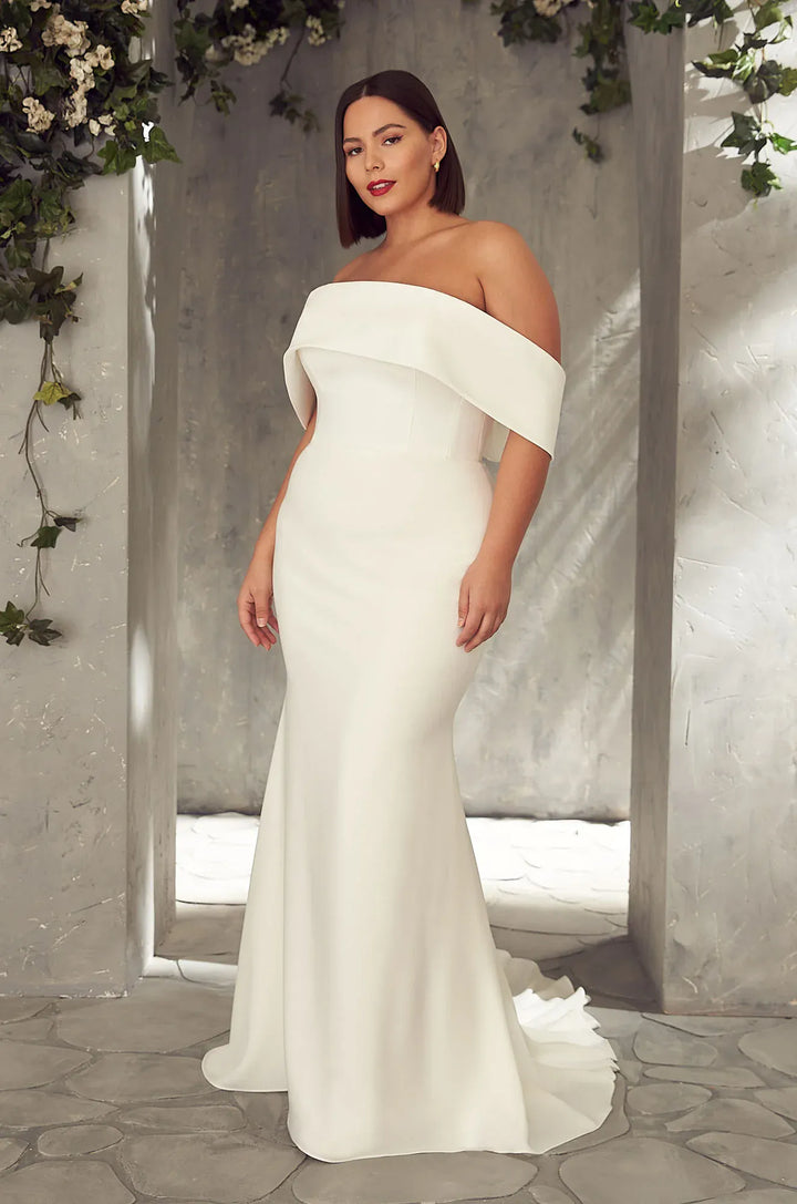 front of mikaella 2405 ivory crepe fitted wedding dress with an off the shoulder neckline 