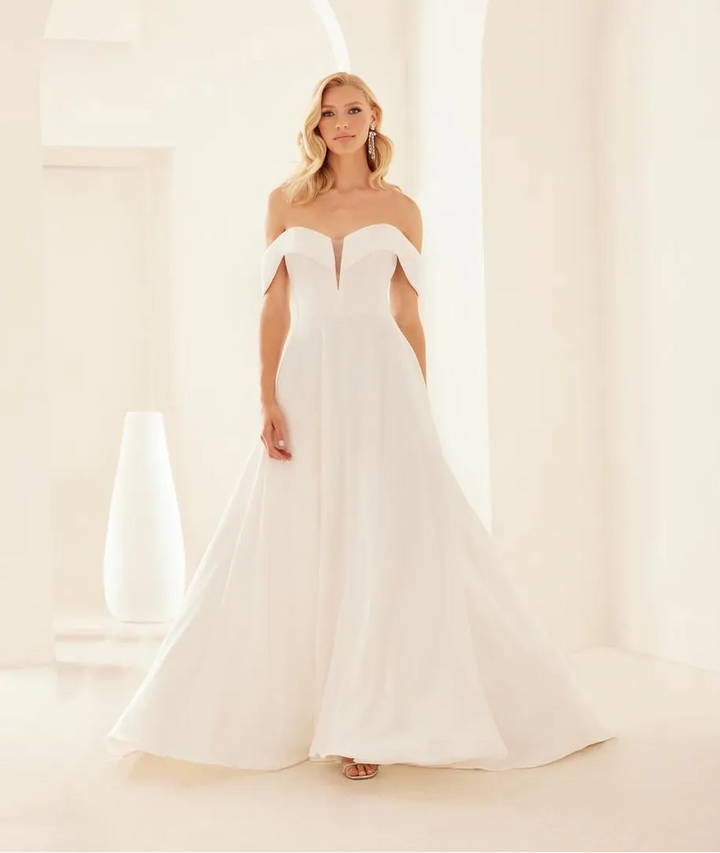 front of mikaella m2433 ivory crepe a-line wedding dress with deep V neckline with foldover accent on the neckline and off the shoulder straps