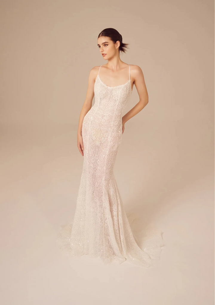 full front of nicole and felicia nf026 ivory lace fitted wedding dress featuring a scoop neckline with thin straps