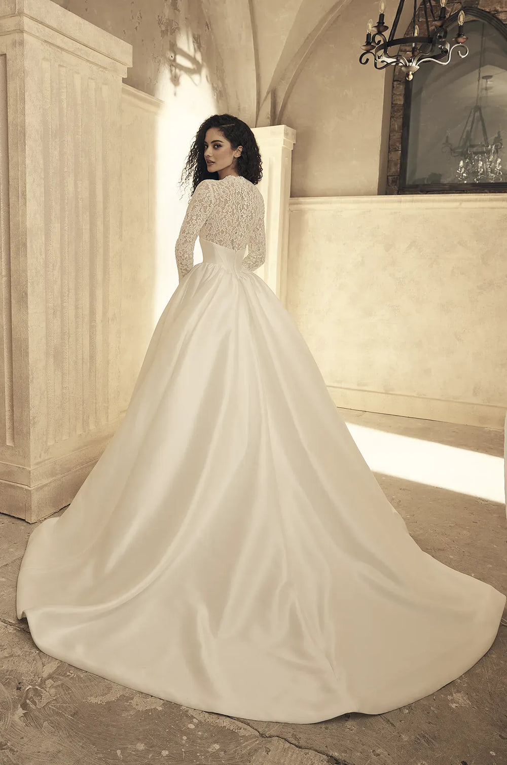 full back of paloma blanca p5154 ivory mikado ball gown wedding dress with a lace bodice and chapel length train