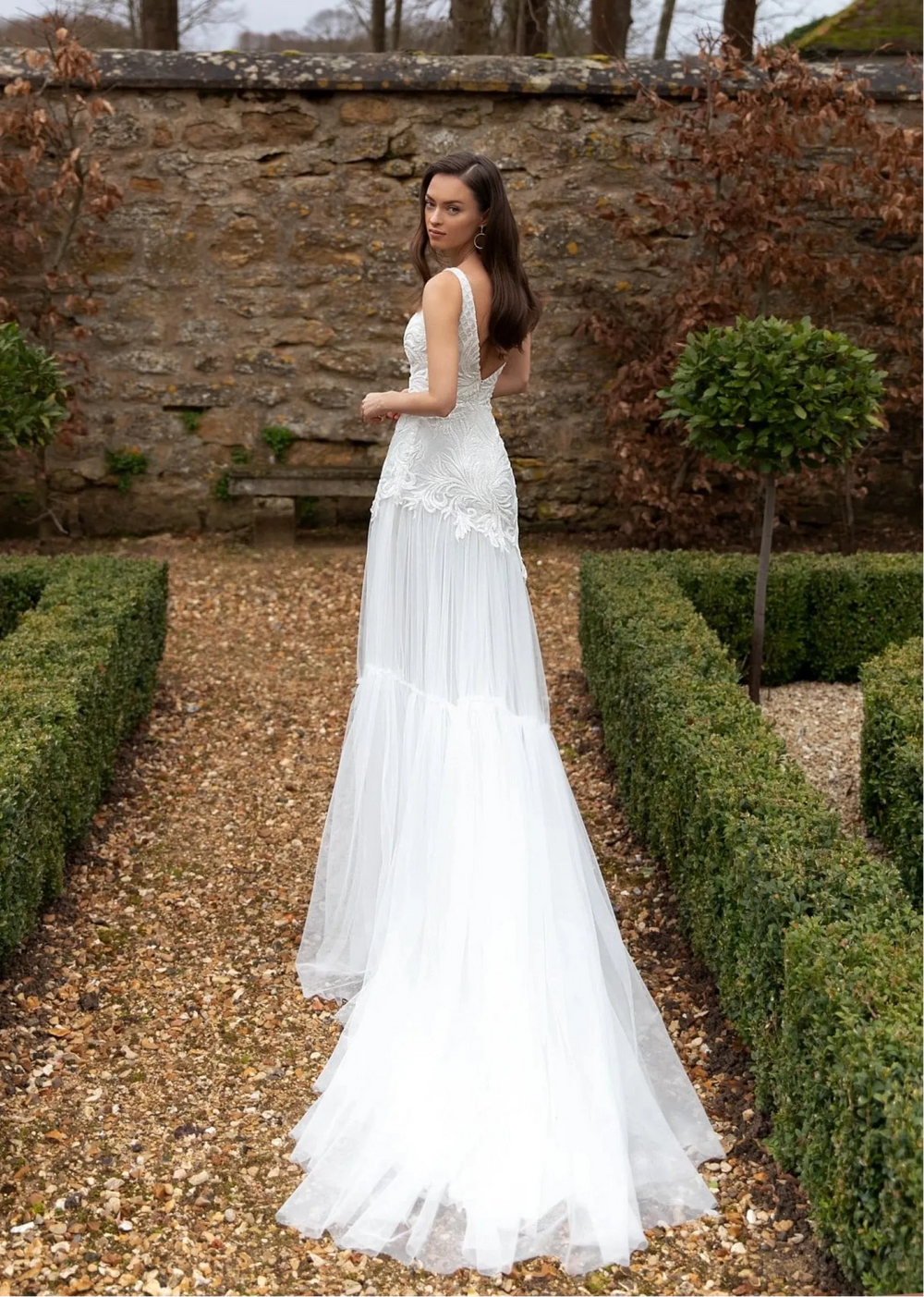 full back of pollardi treasure ivory tulle fitted wedding dress with beaded appliques and a one shoulder neckline
