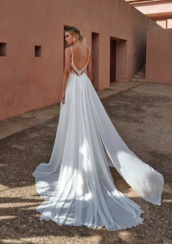 full back of pronovias corinzia ivory chiffon a-line wedding dress featuring a lace bodice with a v neckline
