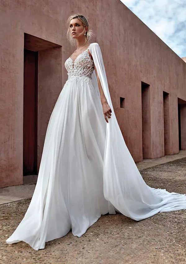 full front of pronovias corinzia ivory chiffon a-line wedding dress featuring a lace bodice with a v neckline