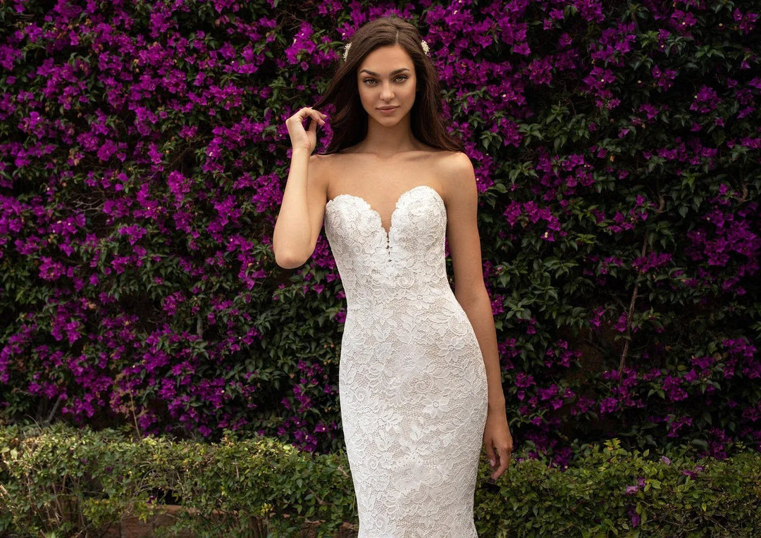 close up of pronovias eithel nude lace fitted wedding dress with a strapless sweetheart neckline