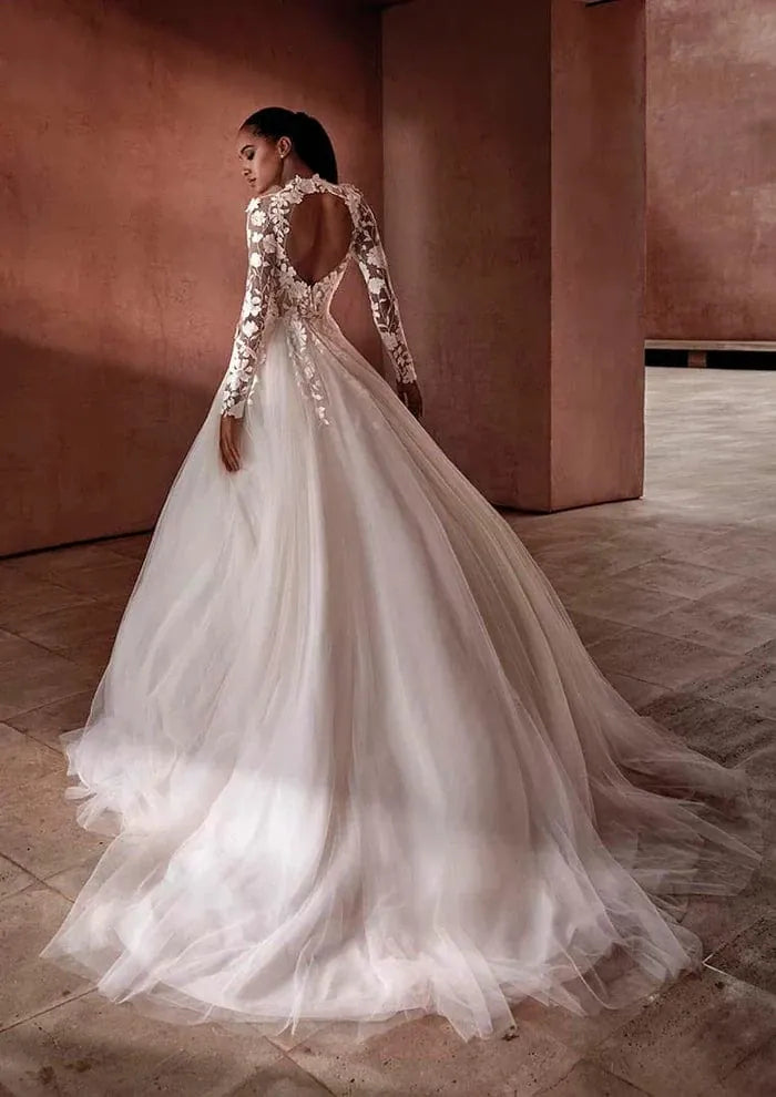 full back of pronovias hamptons ivory tulle ball gown with an illusion lace bodice and long sleeves