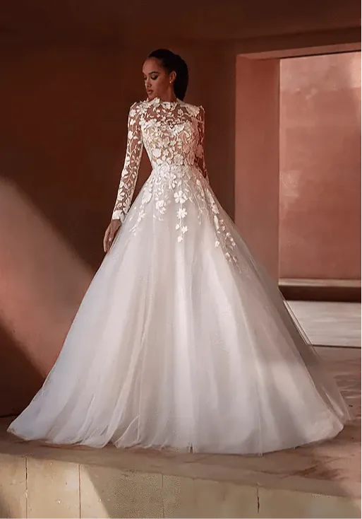 full front of pronovias hamptons ivory tulle ball gown with an illusion lace bodice and long sleeves