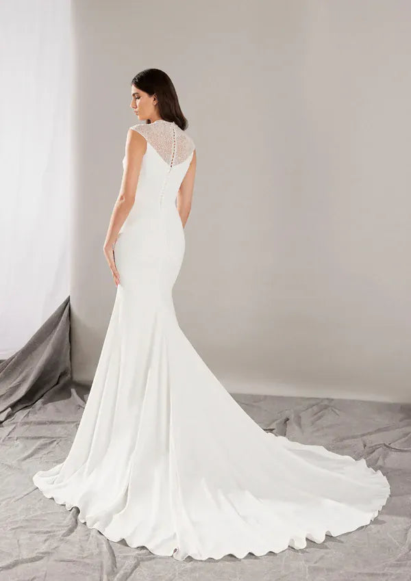 full back of pronovias honore ivory crepe fitted wedding dress with a beaded illusion neckline