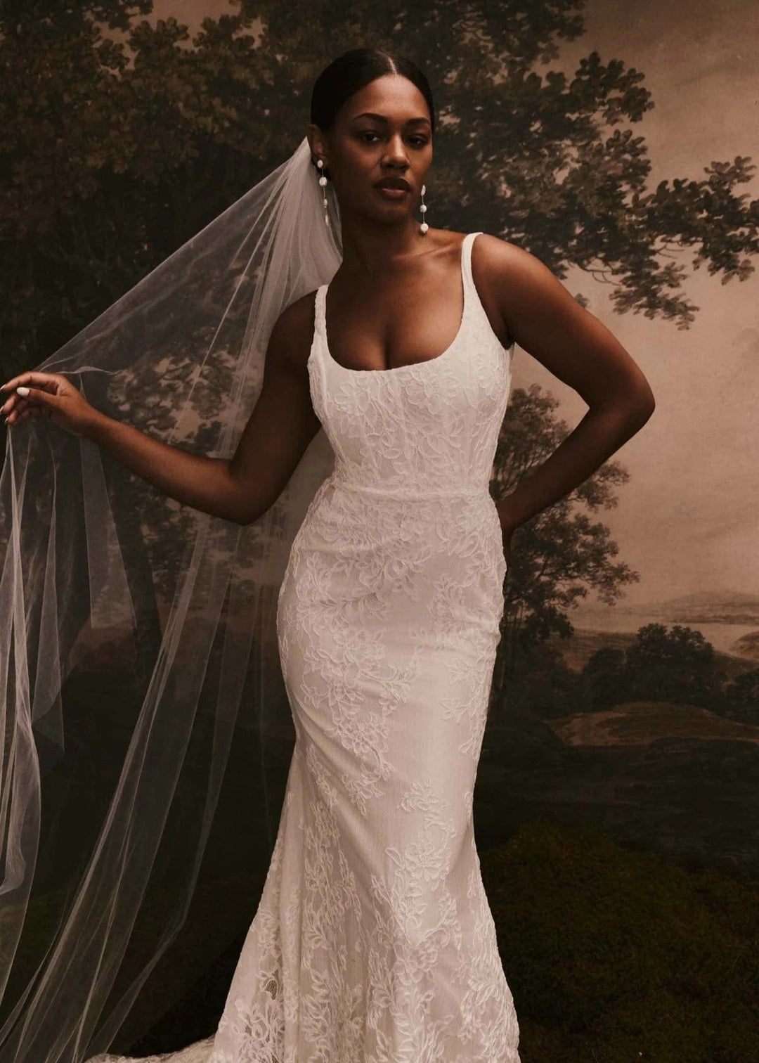 front of renhue esme ivory lace fitted wedding dress with square sleeveless neckline
