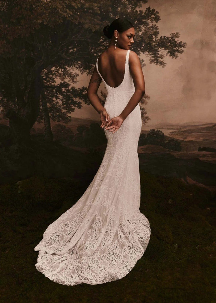 back of renhue esme ivory lace fitted wedding dress with open back and short lace train