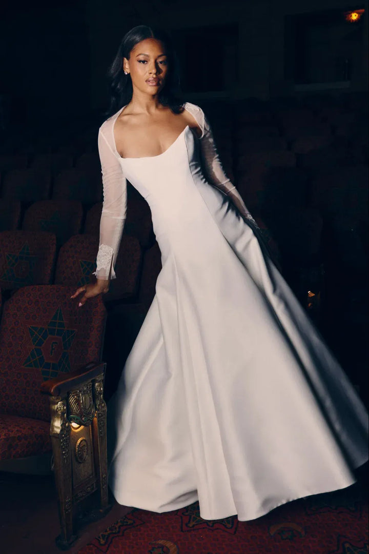 front of renhue ella ivory mikado a-line wedding dress with cat eye bodice and strapless neckline