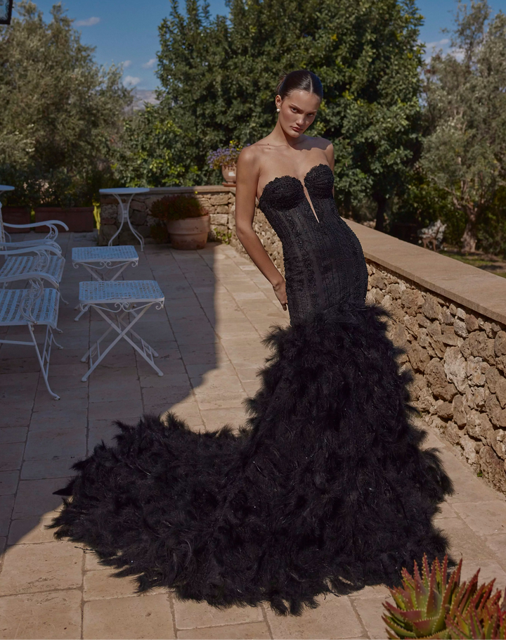 front of ricca sposa 25-013 black fit and flare wedding dress with a beaded strapless bodice and feathered skirt
