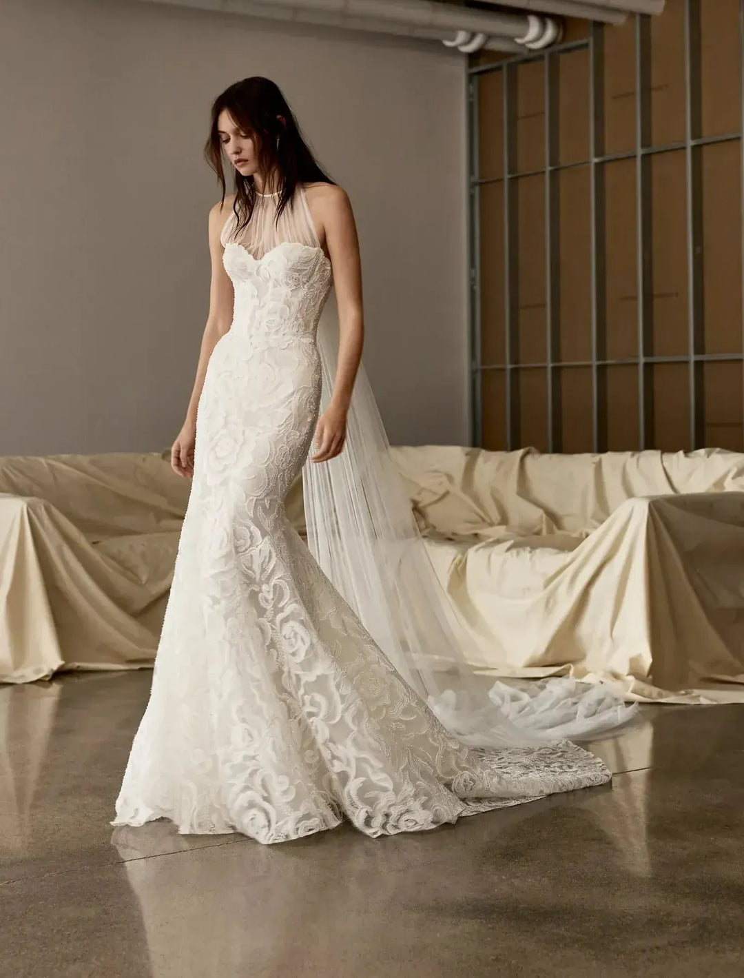 full front of rivini cameron ivory lace fitted wedding dress featuring a detachable tulle neckline that goes over the bodice for two different looks
