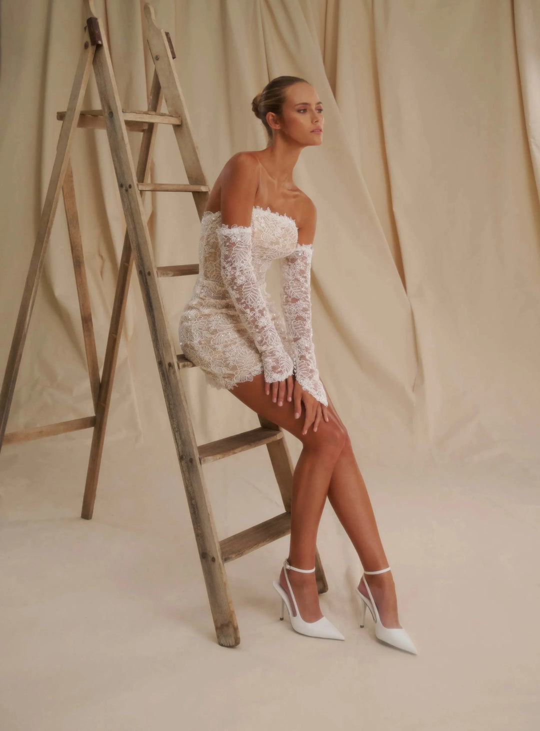 front of senstudio se017 little white dress showing the full front with strapless neckline and thigh high skirt